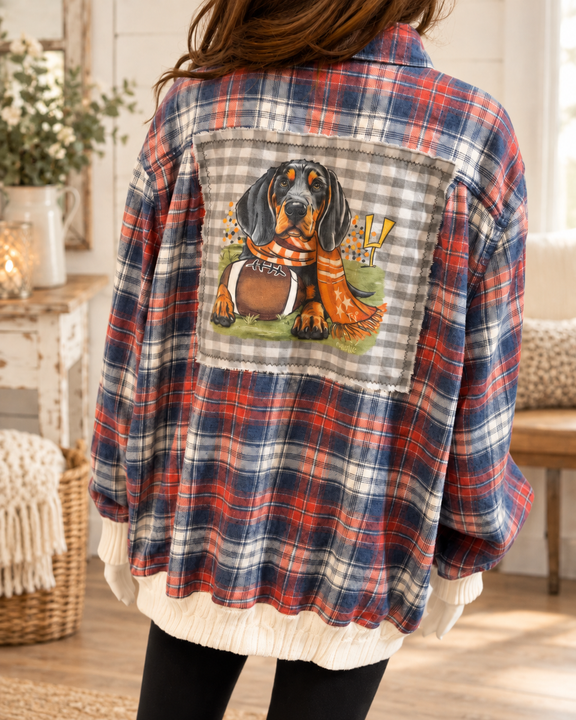 Back of upcycled flannel with football dog design and cream knit trim, cottage background